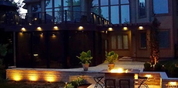 full view of lighting & fire pit landscape Kansas City